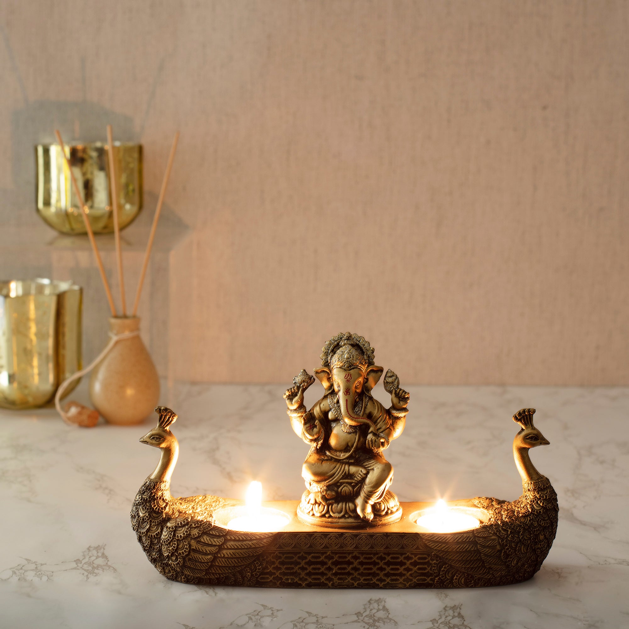 Dynast Polyresin Embellished Ganesha Hand Finished Figurine Cum Tealight Holder 14Cm in Gold Colour