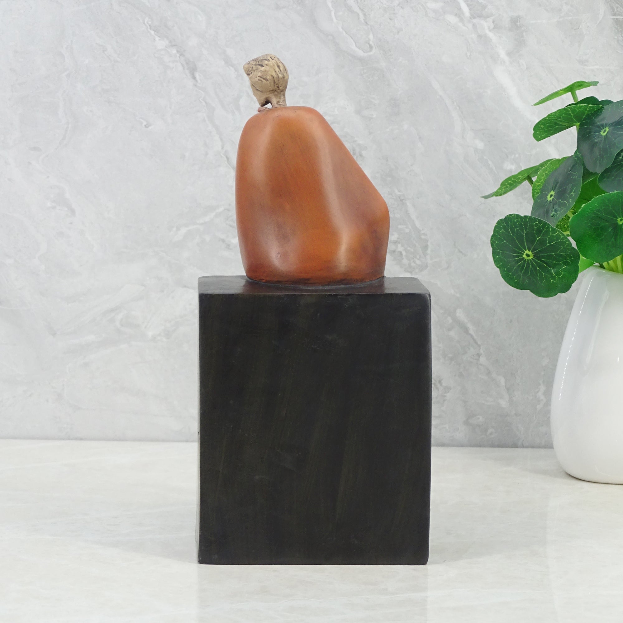 Alpine Polyresin Man Posing On Bench 23 Cm in Brown Colour