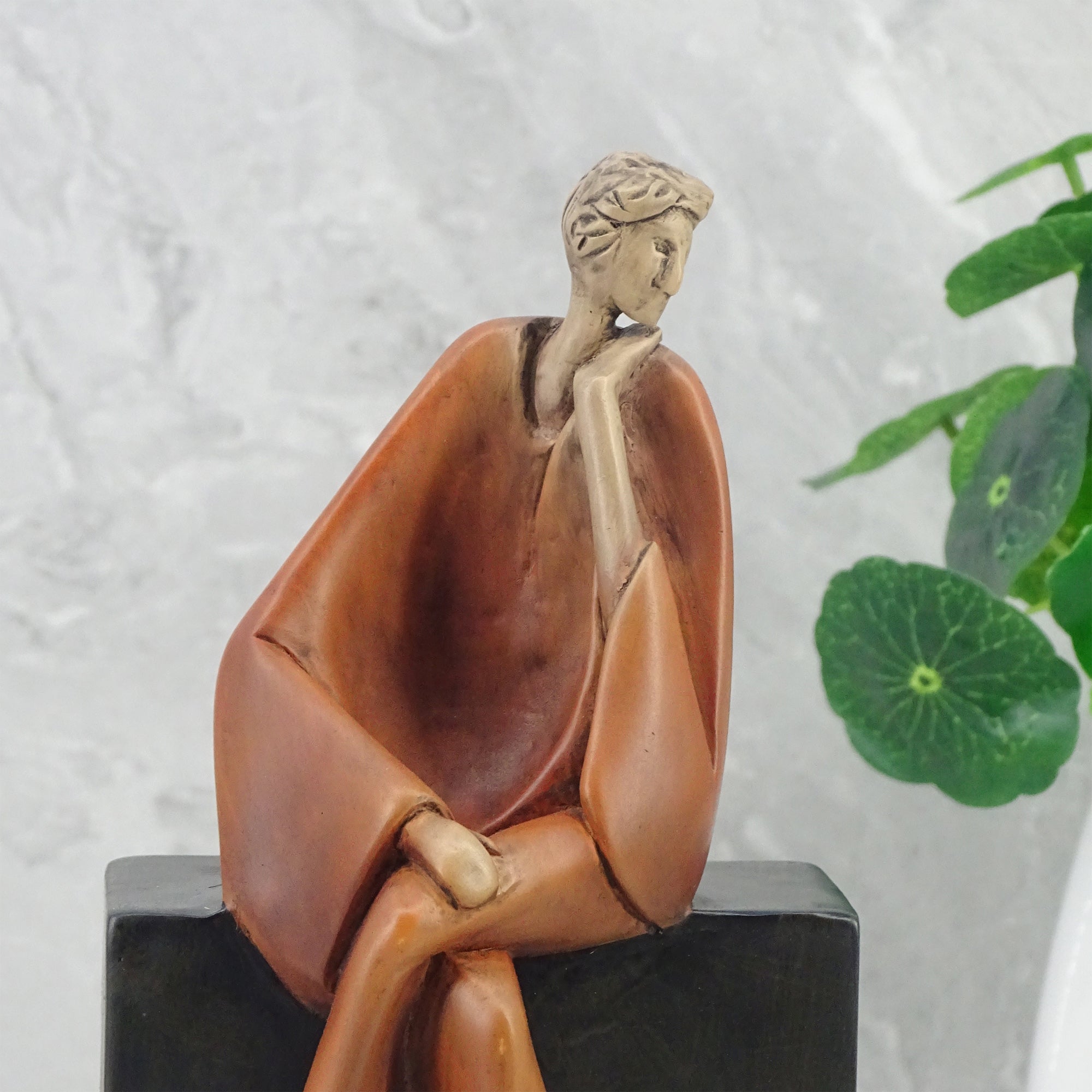Alpine Polyresin Man Posing On Bench 23 Cm in Brown Colour