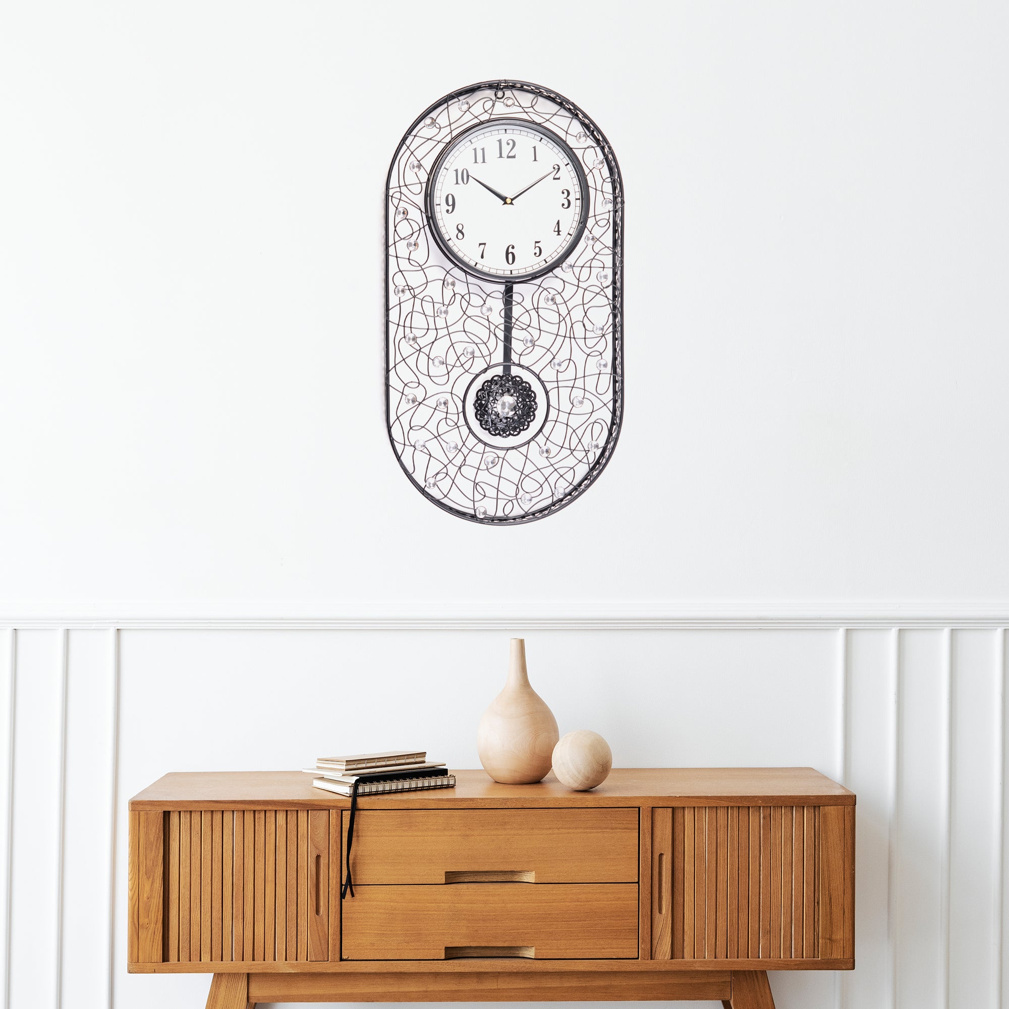 Rhythm Metal And Glass Oval Pendulum Wall Clock in Black Colour