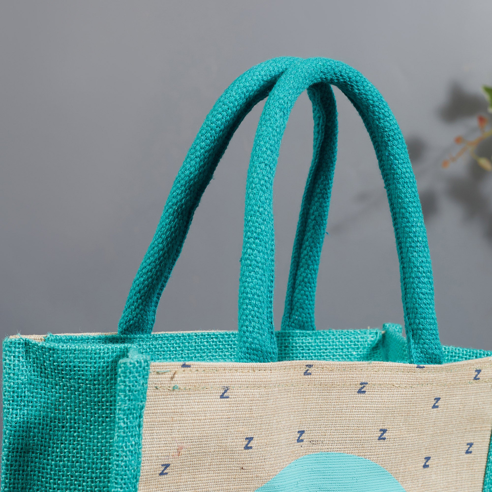 Good Life Jute Reversible Lazy Lamhe Printed Lunch Bag 25.5 x 25.5 Cm in Turq Colour