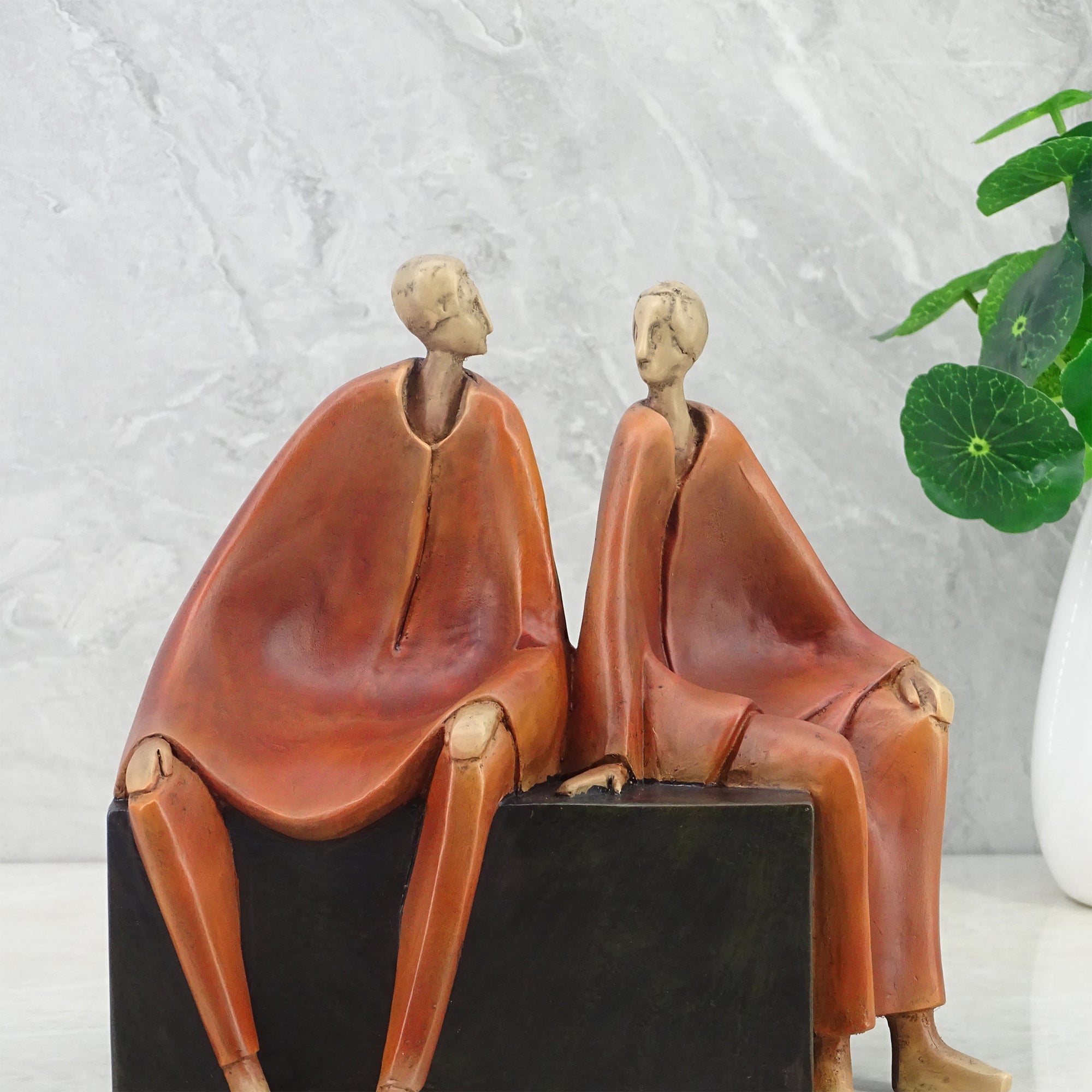 Alpine Polyresin Men Sitting On Bench 18 Cm in Brown Colour