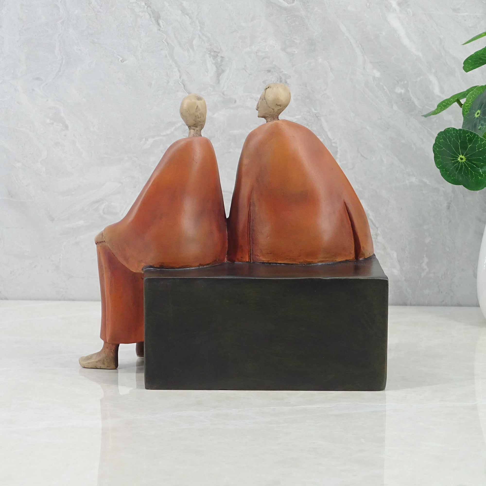 Alpine Polyresin Men Sitting On Bench 18 Cm in Brown Colour