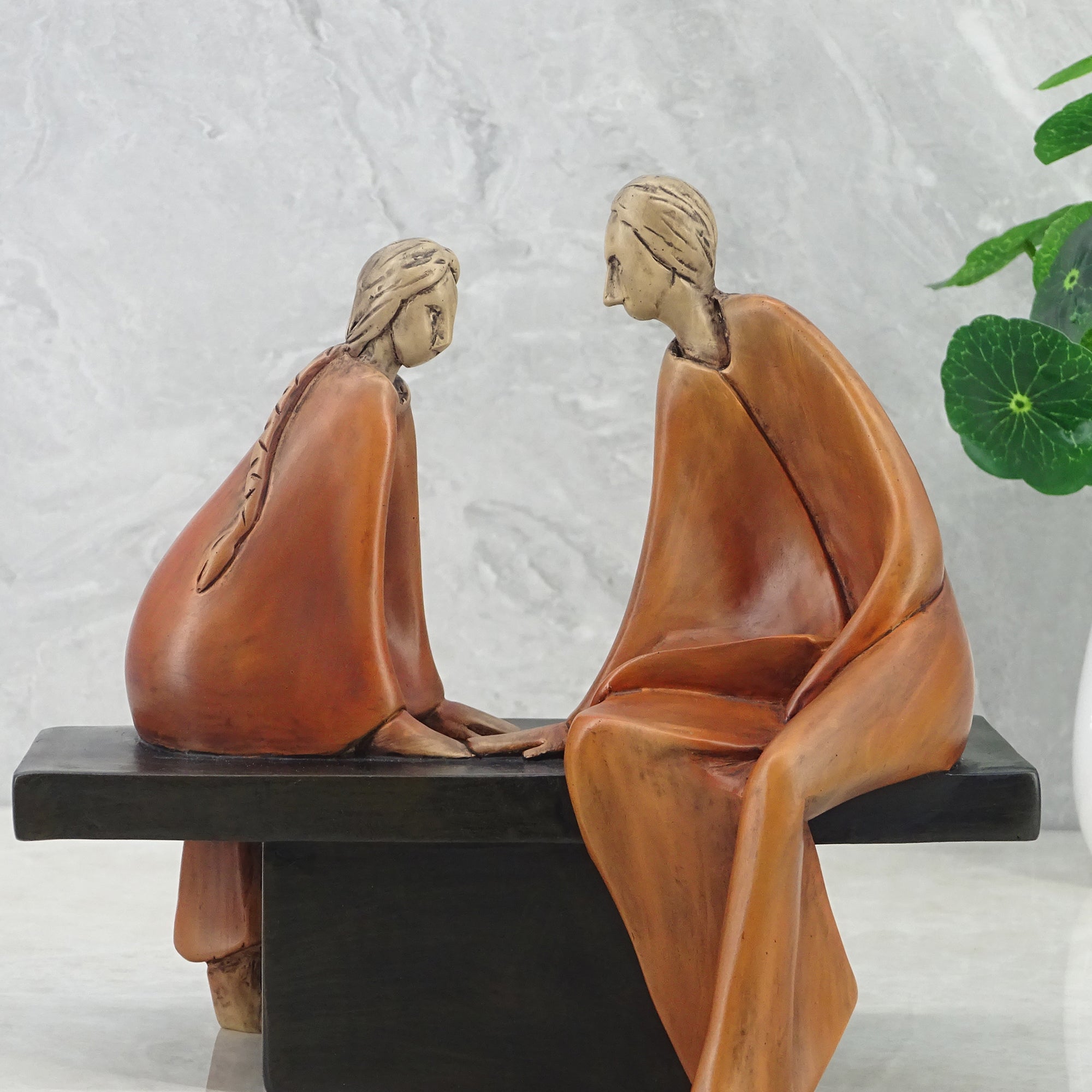 Alpine Polyresin Couple Sitting On Bench 18 Cm in Brown Colour