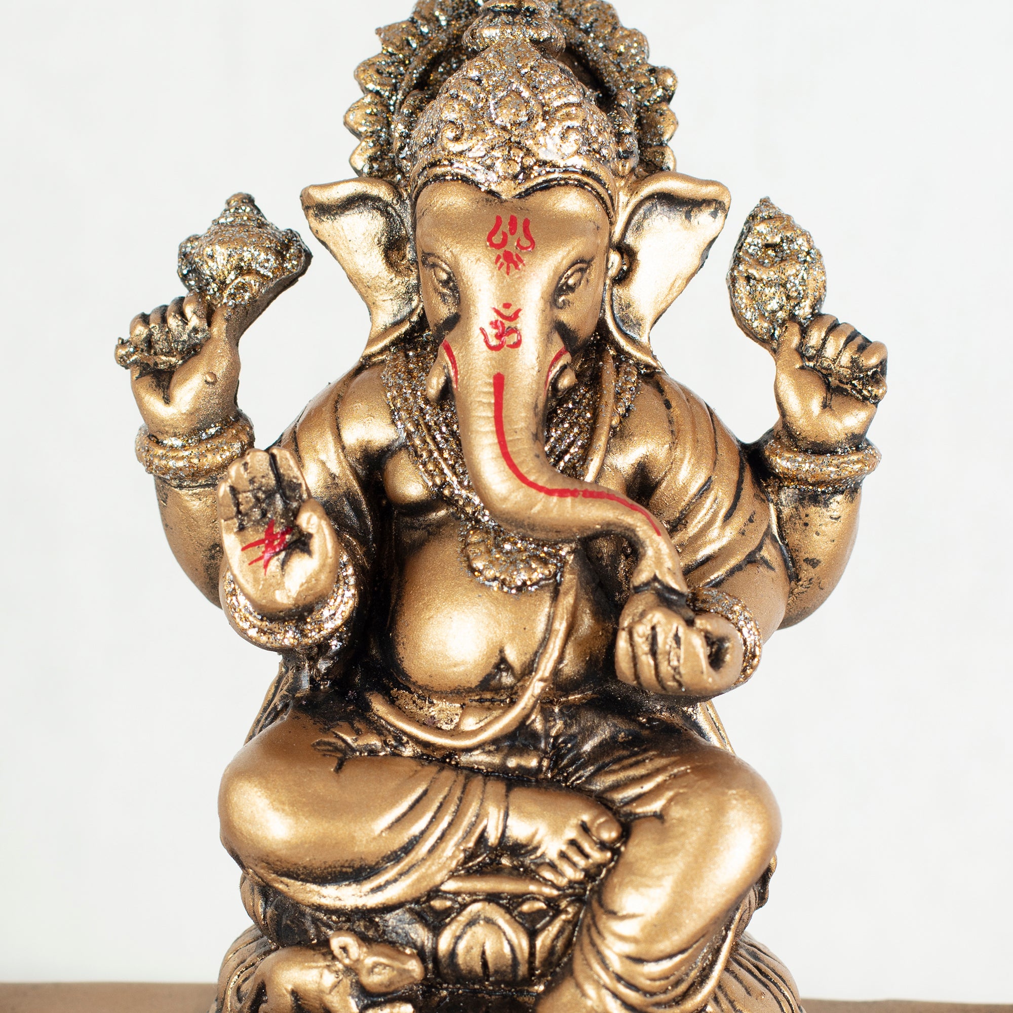 Dynast Polyresin Embellished Ganesha Hand Finished Figurine Cum Tealight Holder 14Cm in Gold Colour