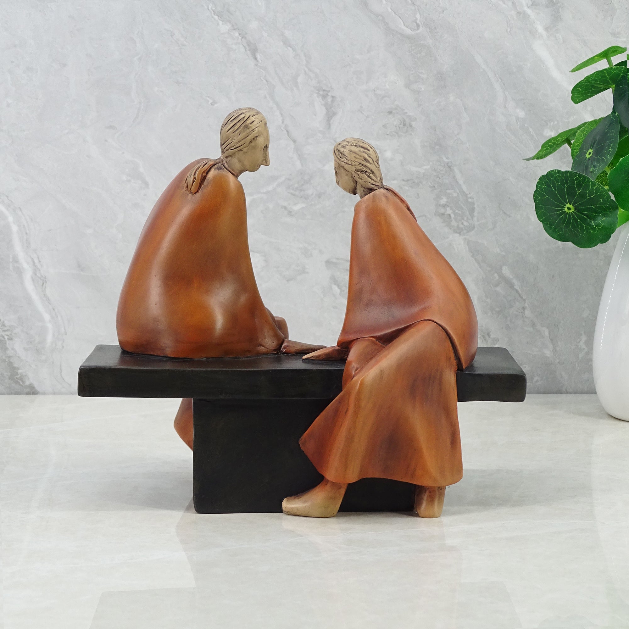 Alpine Polyresin Couple Sitting On Bench 18 Cm in Brown Colour