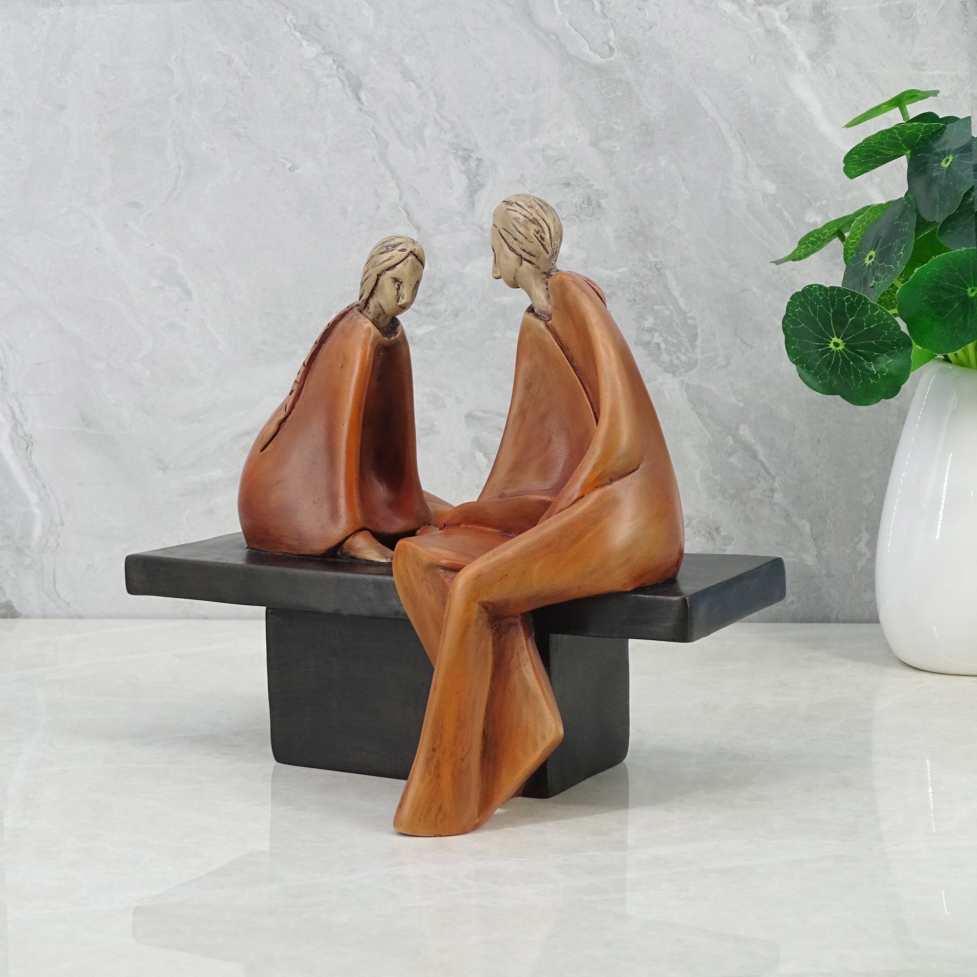 Alpine Polyresin Couple Sitting On Bench 18 Cm in Brown Colour