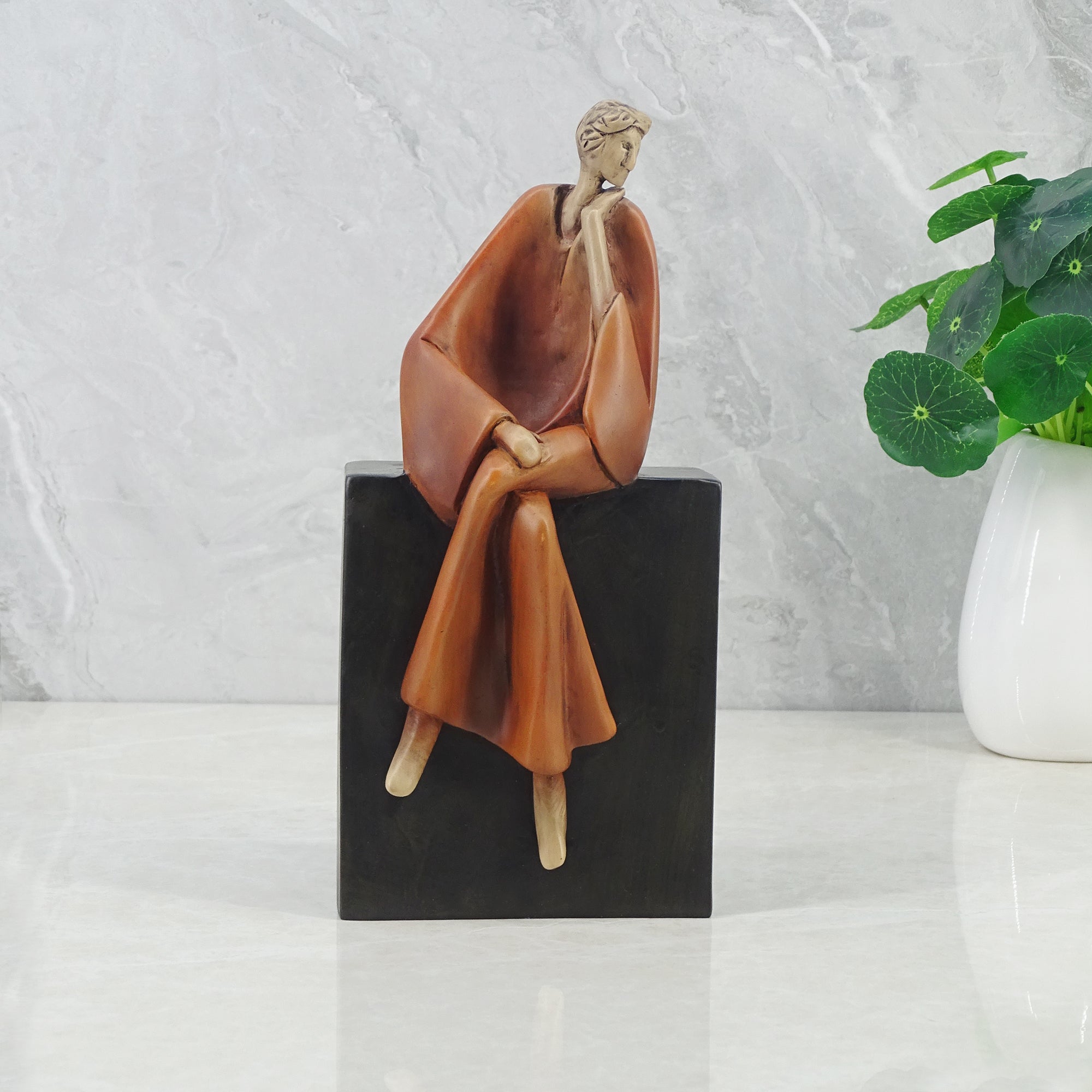 Alpine Polyresin Man Posing On Bench 23 Cm in Brown Colour