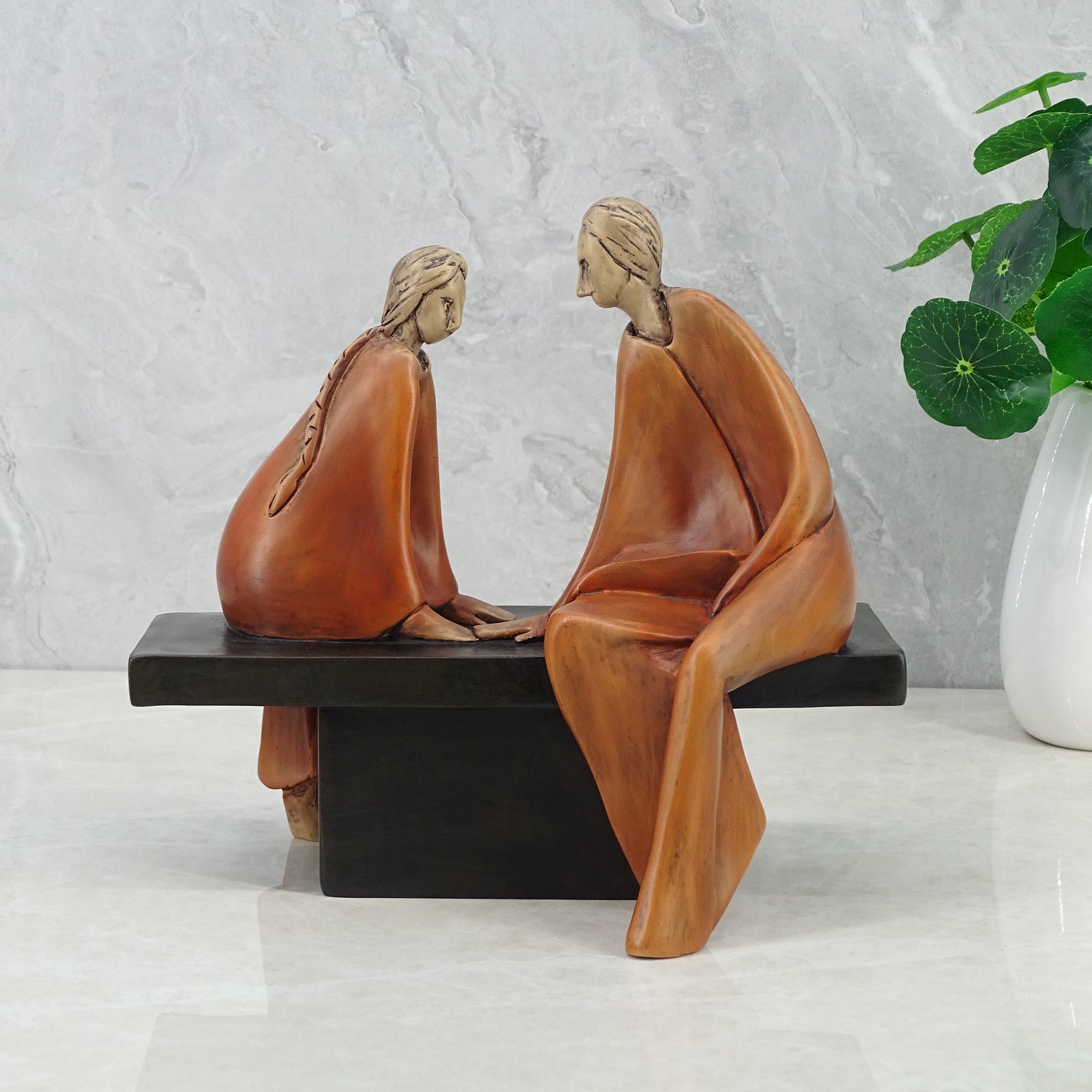 Alpine Polyresin Couple Sitting On Bench 18 Cm in Brown Colour