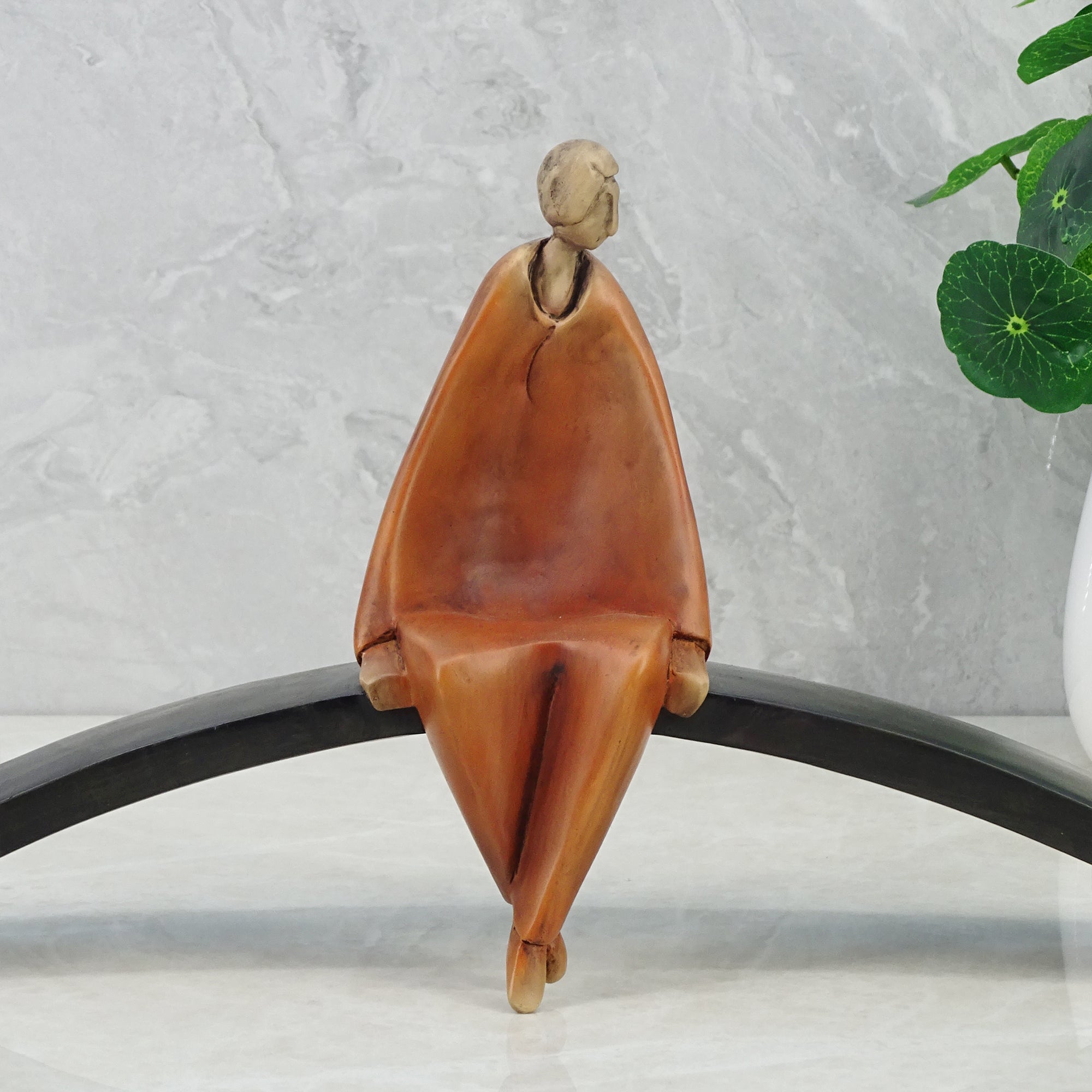Alpine Polyresin Man Sitting On Cirque 19 Cm in Brown Colour