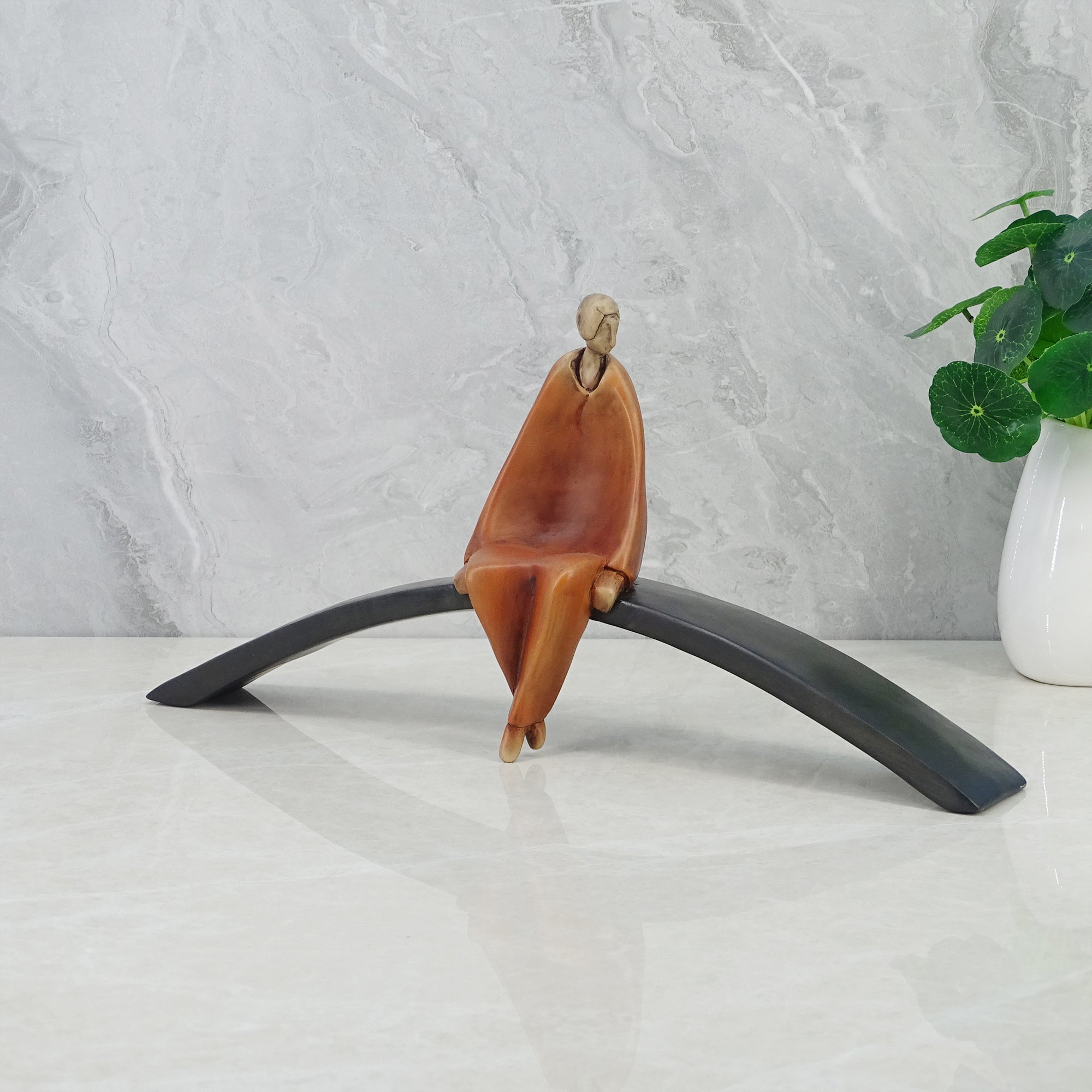 Alpine Polyresin Man Sitting On Cirque 19 Cm in Brown Colour