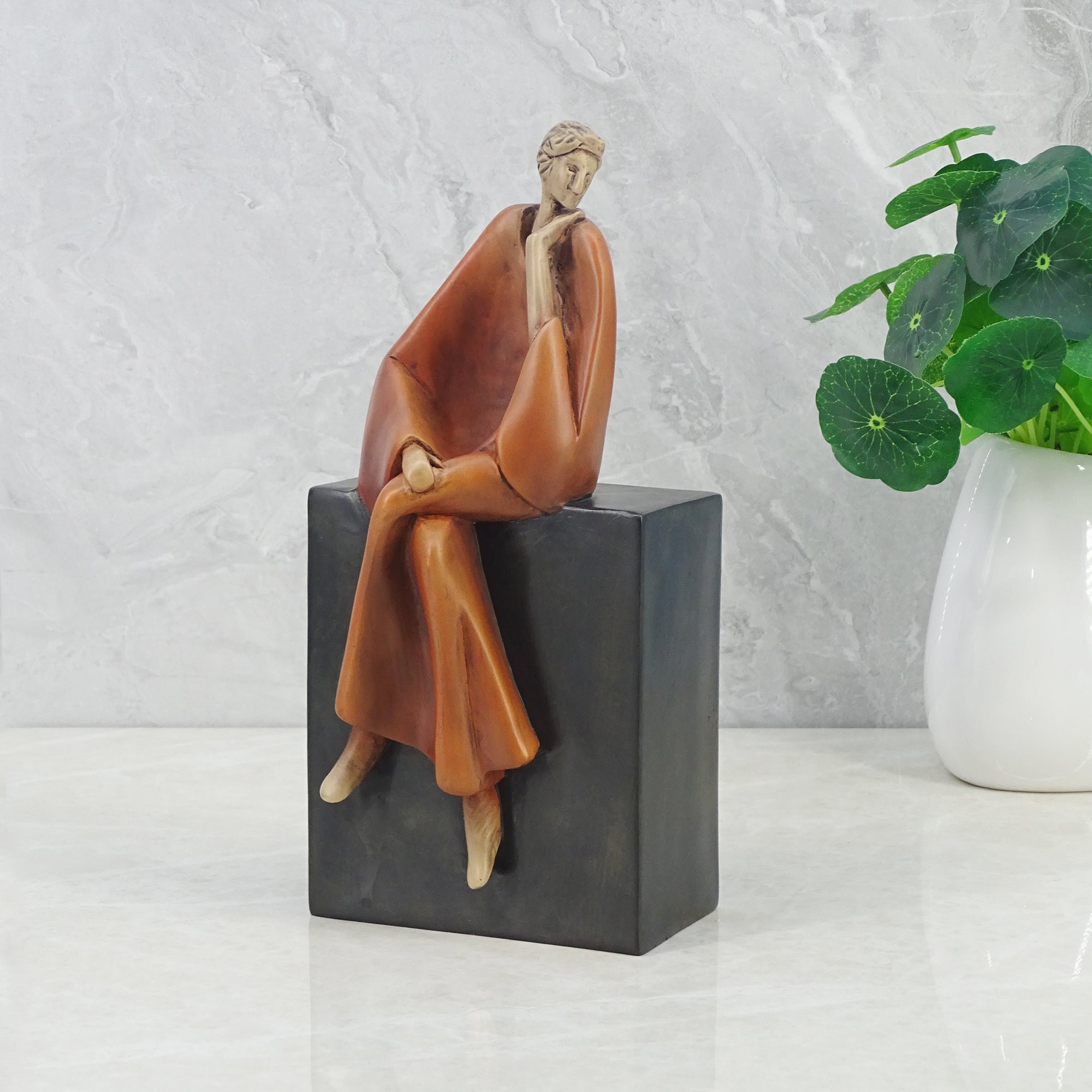 Alpine Polyresin Man Posing On Bench 23 Cm in Brown Colour