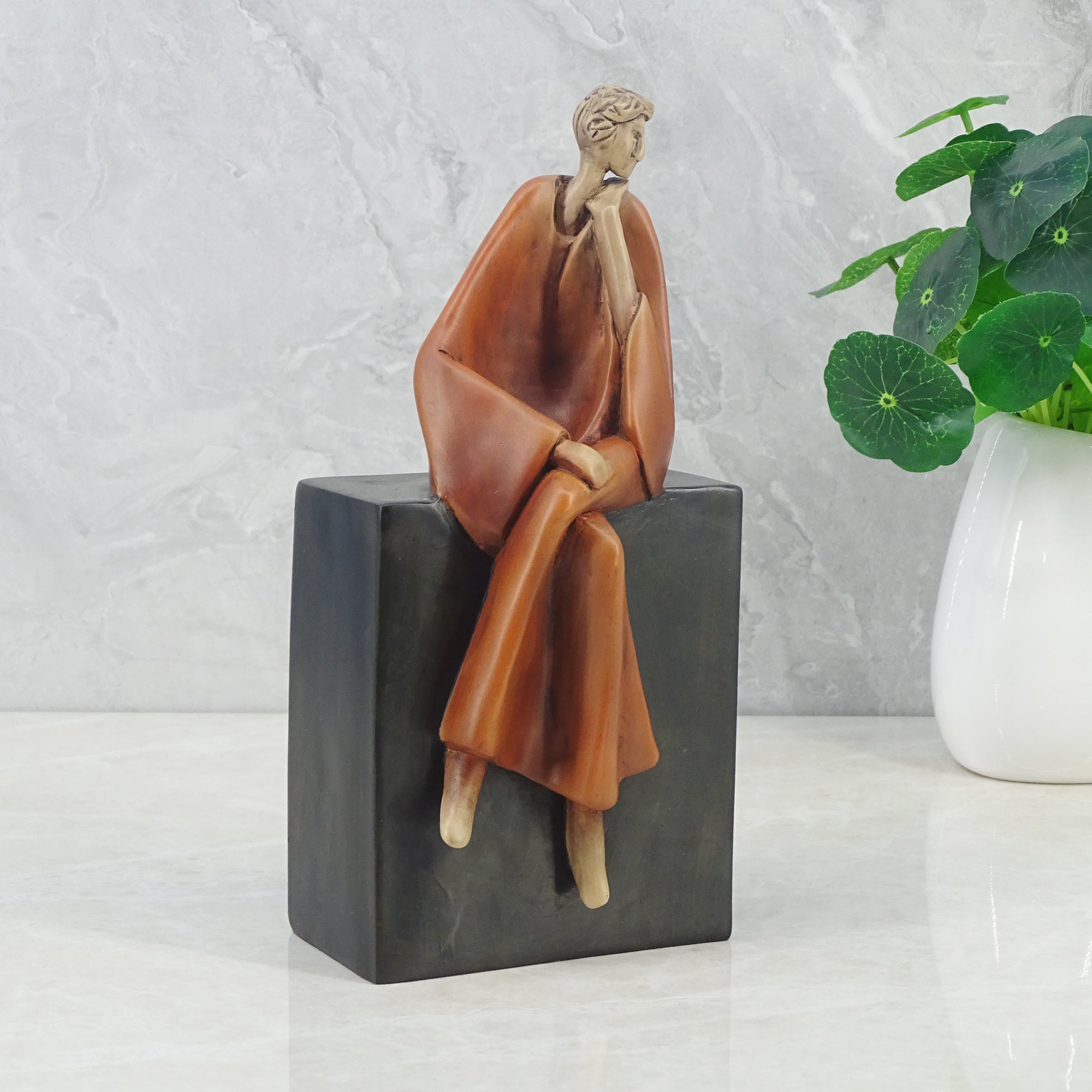 Alpine Polyresin Man Posing On Bench 23 Cm in Brown Colour