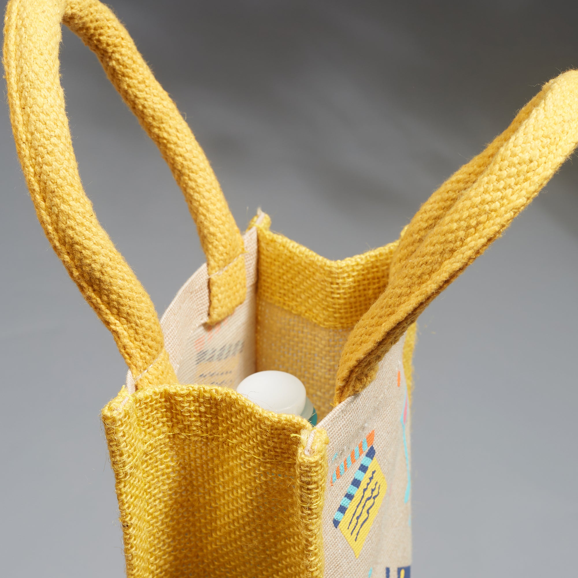 Good Life Jute Reversible Dessert Printed Bottle Bag 12 x 35.5 Cm in Yellow Colour