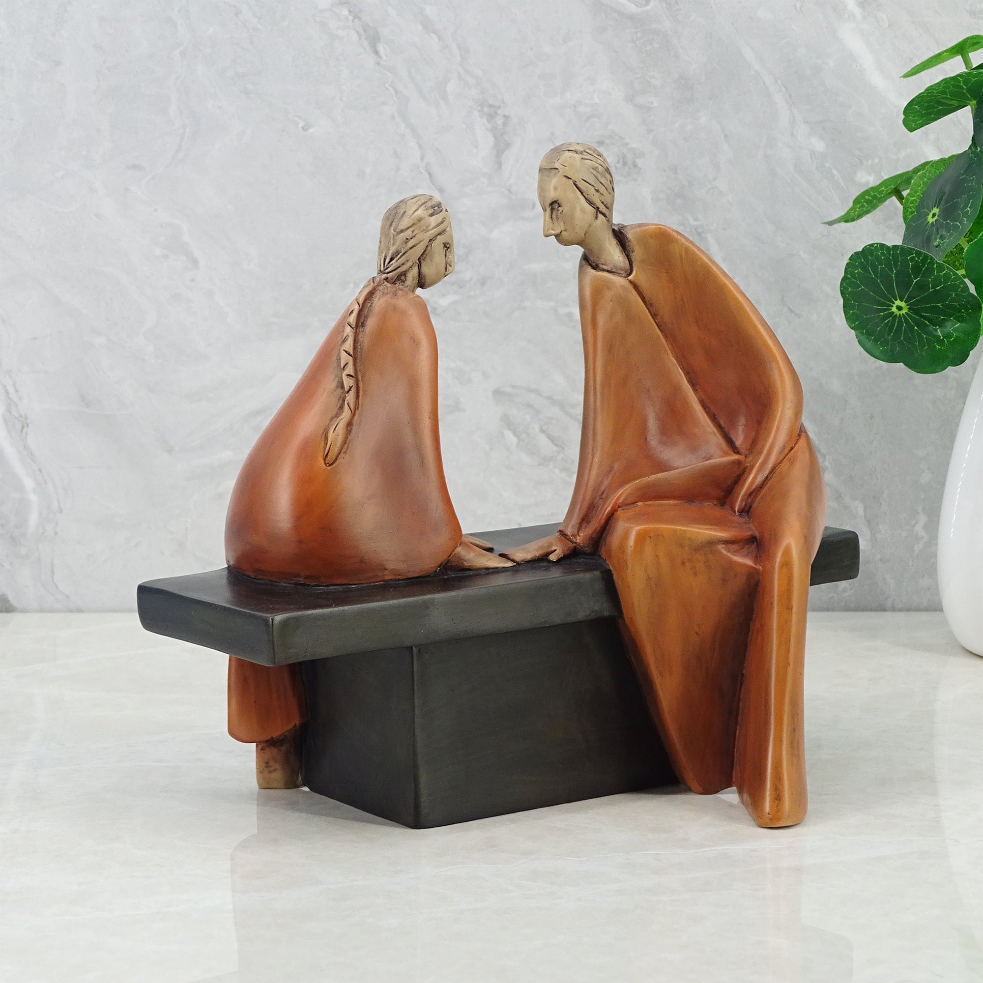 Alpine Polyresin Couple Sitting On Bench 18 Cm in Brown Colour